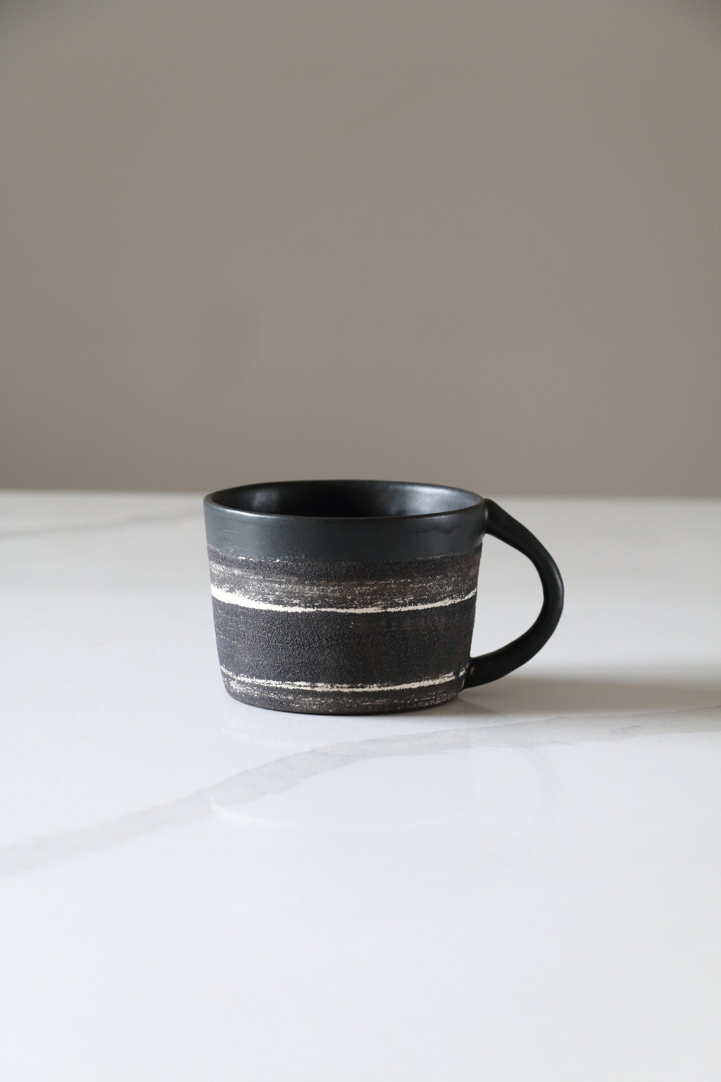 Meta-Morphic Coffee Cup  •  10oz • Black